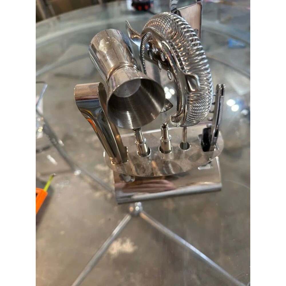 5-piece stainless steel bar tool set with a matching display stand